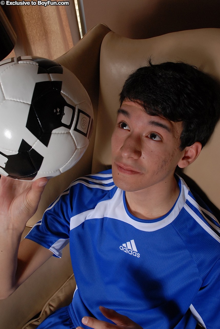 Young gay Alexander Cruz takes off his soccer uniform and jerks off