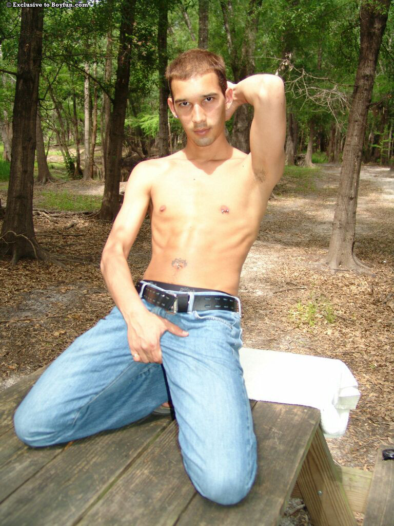 Sexy gay Latino Rico strips at the park & shows his lean body & big dick  