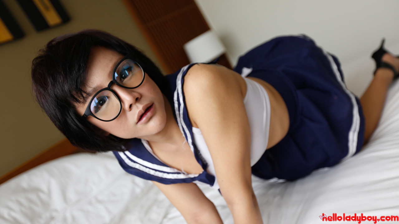Hot Asian schoolgirl shows off her big booty and gives a POV blowjob  
