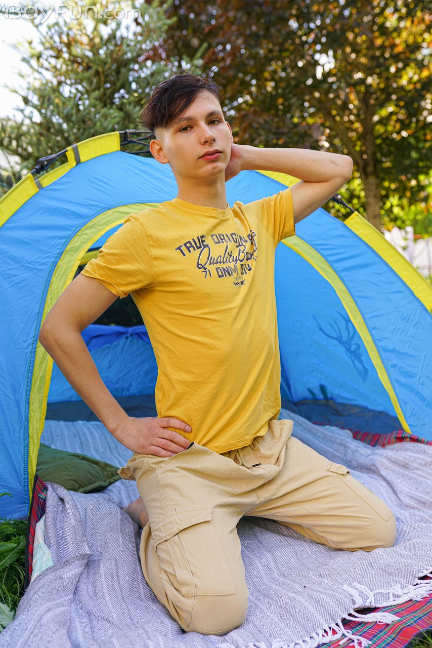Slim European gay Rimi Morty doffs his clothes slowly & masturbates in a tent  