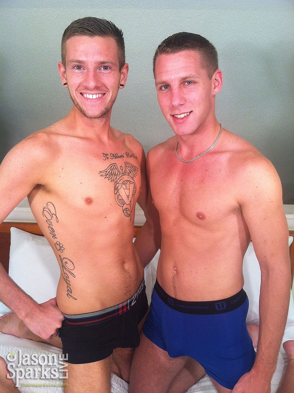Skinny gay Americans Alex Woods & Elliott Vance bang passionately on a bed