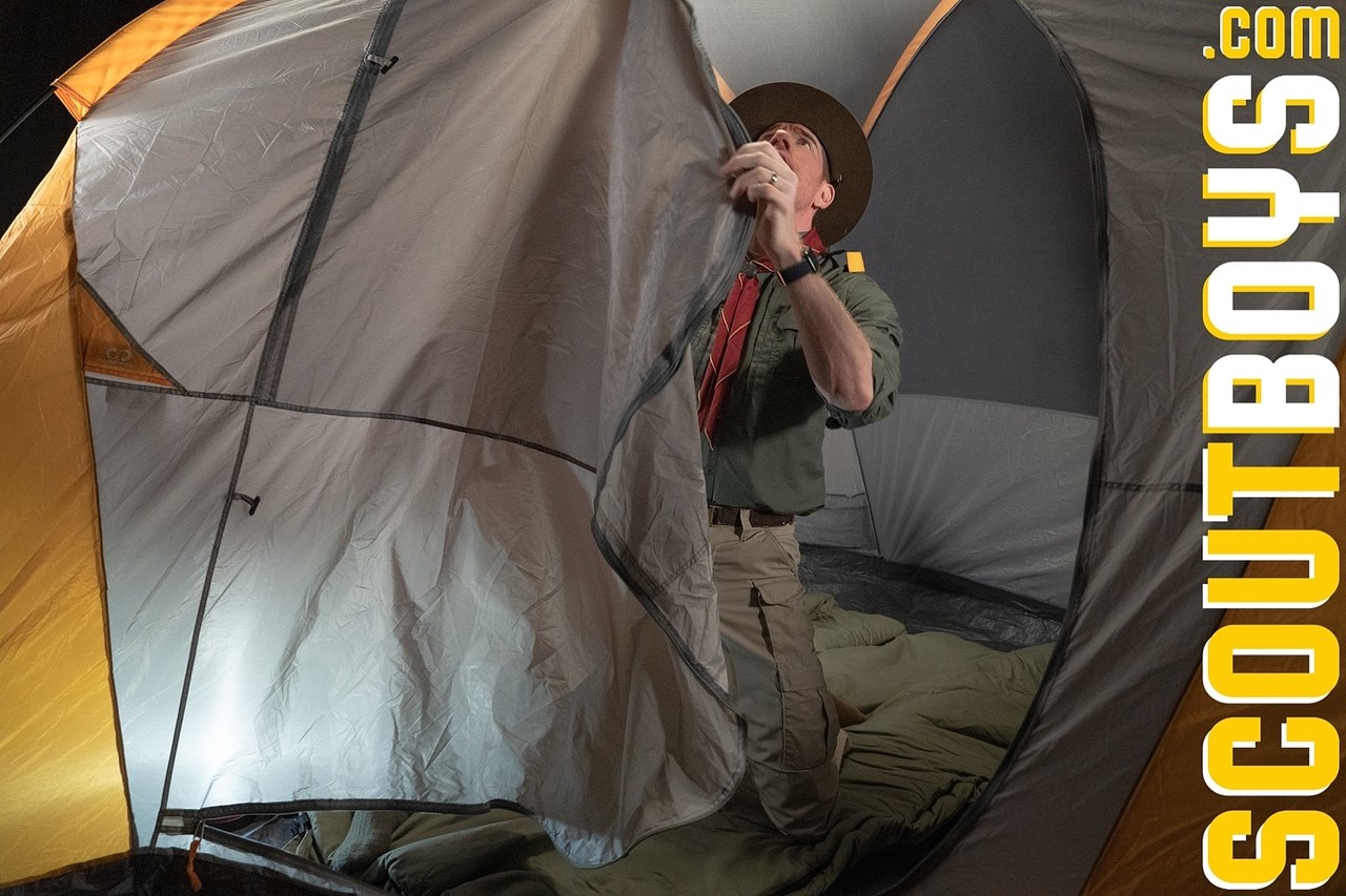Skinny twink Scout Richie kisses his scoutmaster and takes his dick in a tent